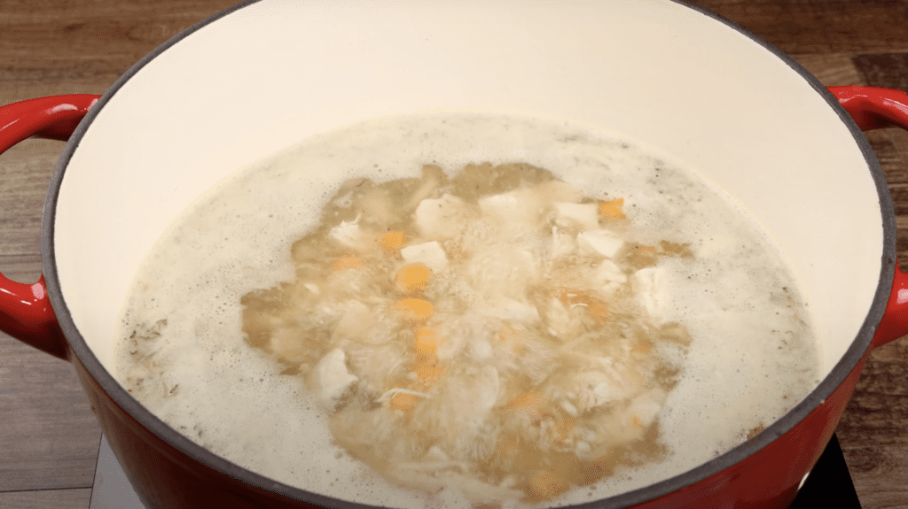 Boiling the broth for soup